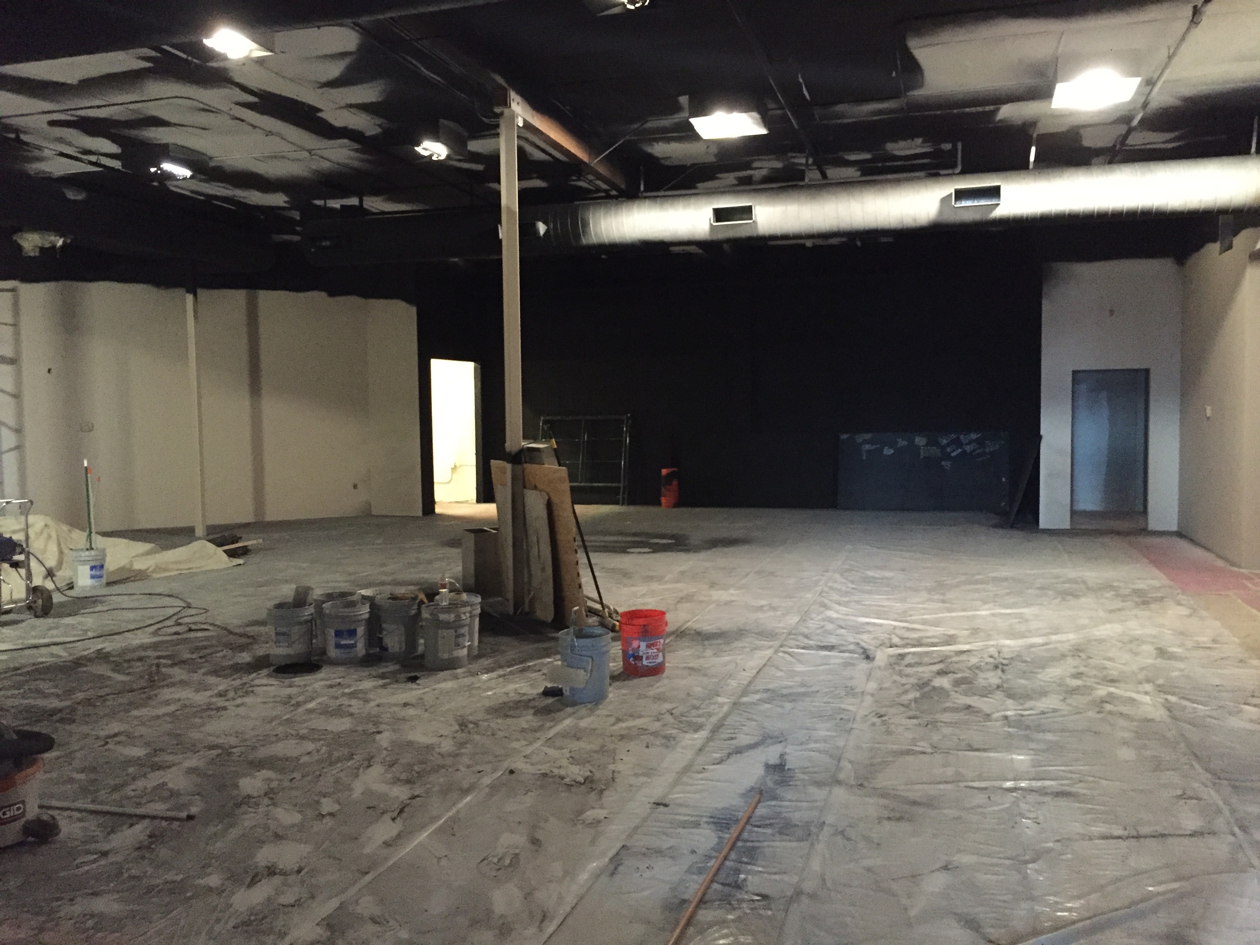 Looking toward the stage from the auditorium entry doors.