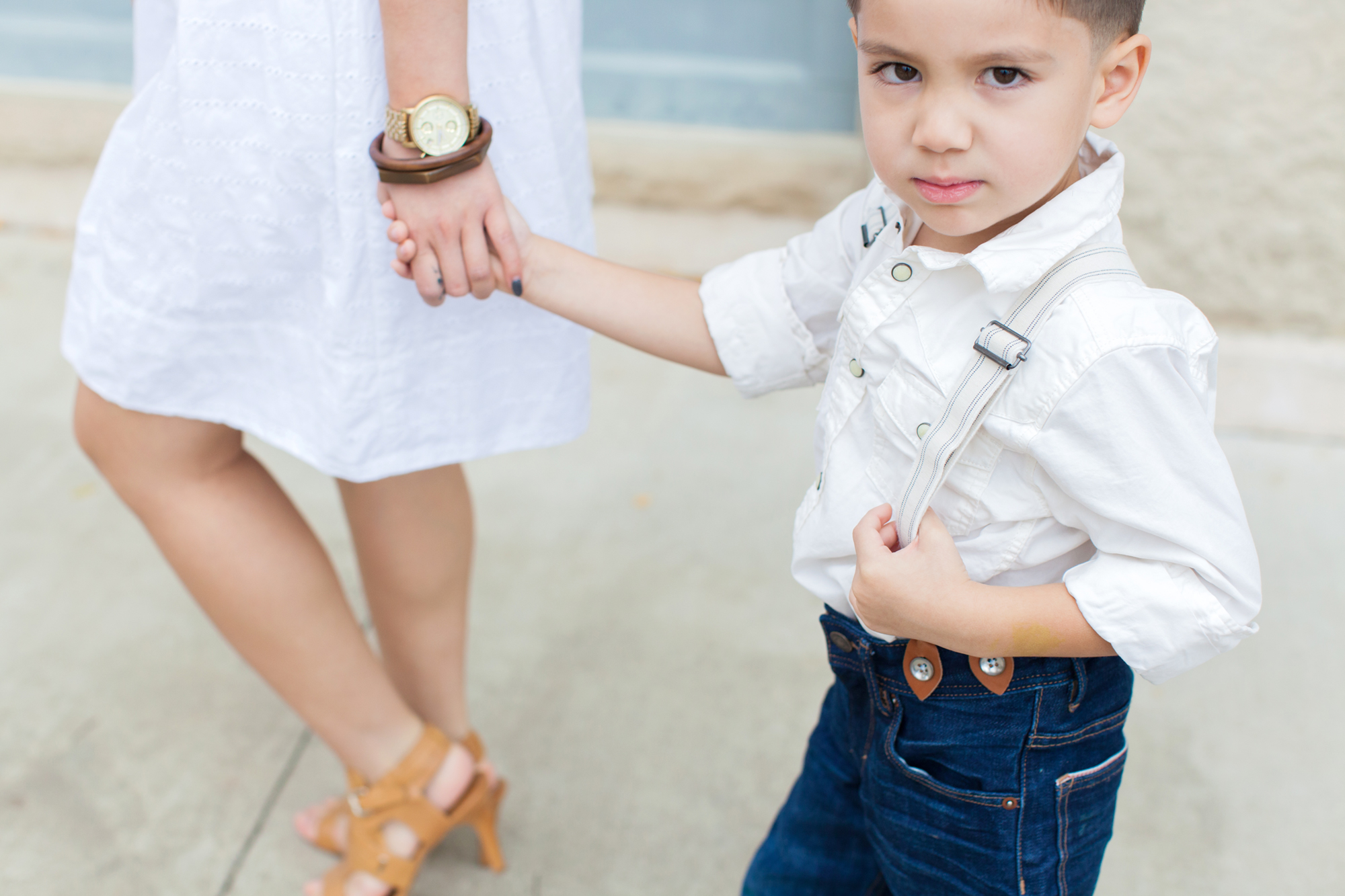 The cutest kid throwing the cutest shade ever.