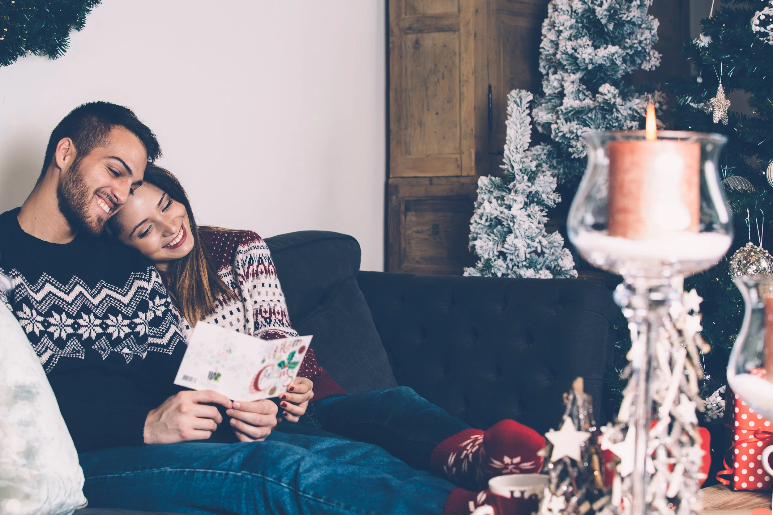 Happy family reading post-card together