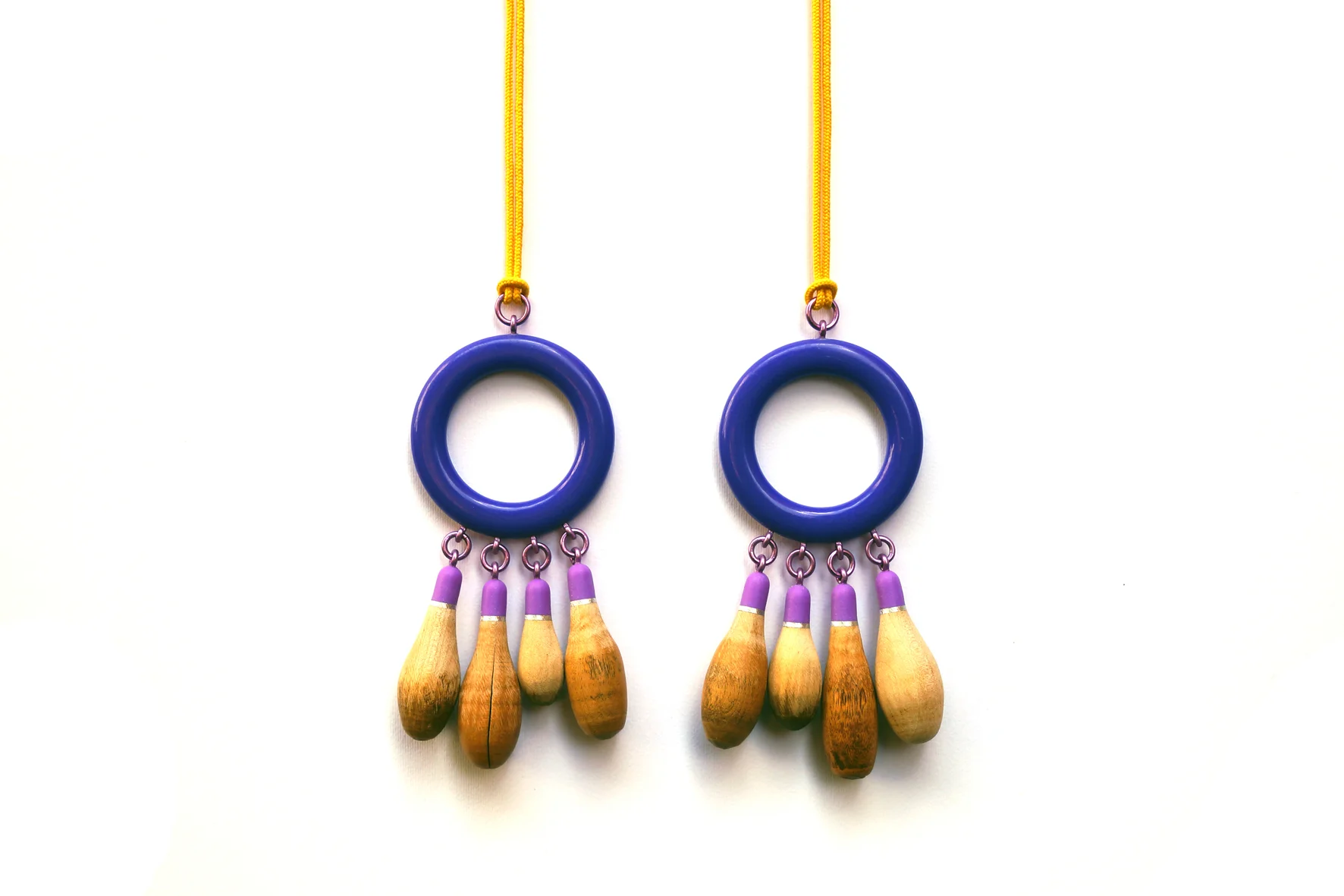 necklaces, plastic/wood/aluminium/textile cord, 570x70x20 mm, 2016 Model: Sara Lundkvist