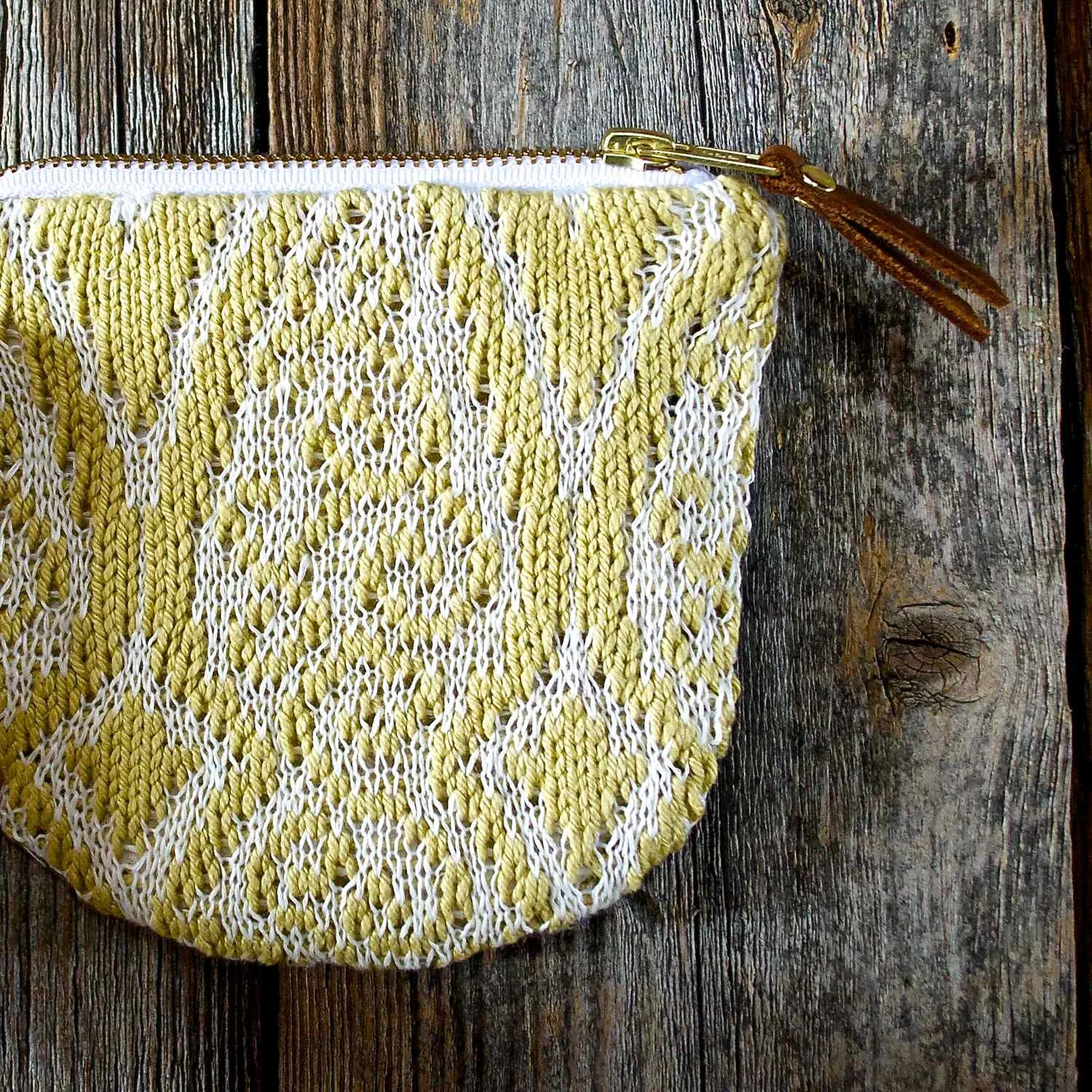 This pocket pouch in mustard is available now . More colors on the way next week!