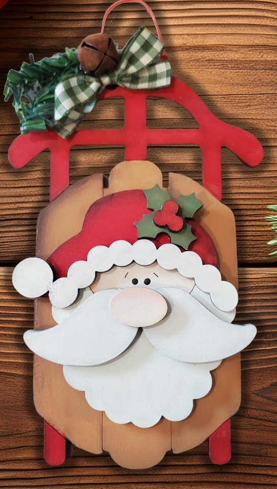 Santa face on sled ornament
