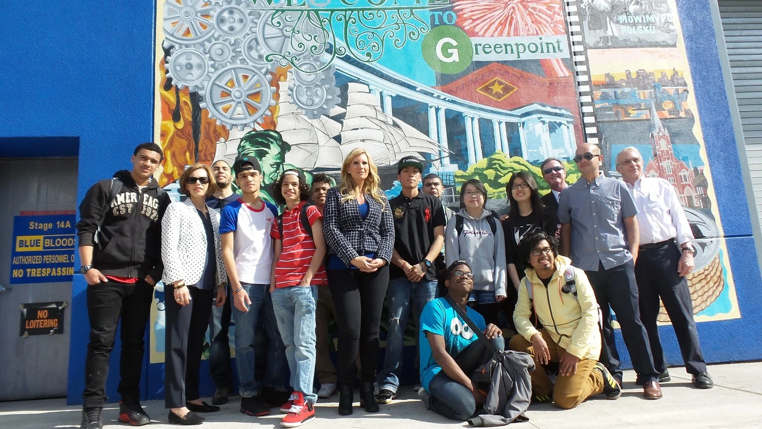 Broadway Stages president Gina Argento (center) and Participants of the Groundswell Community Mural Project