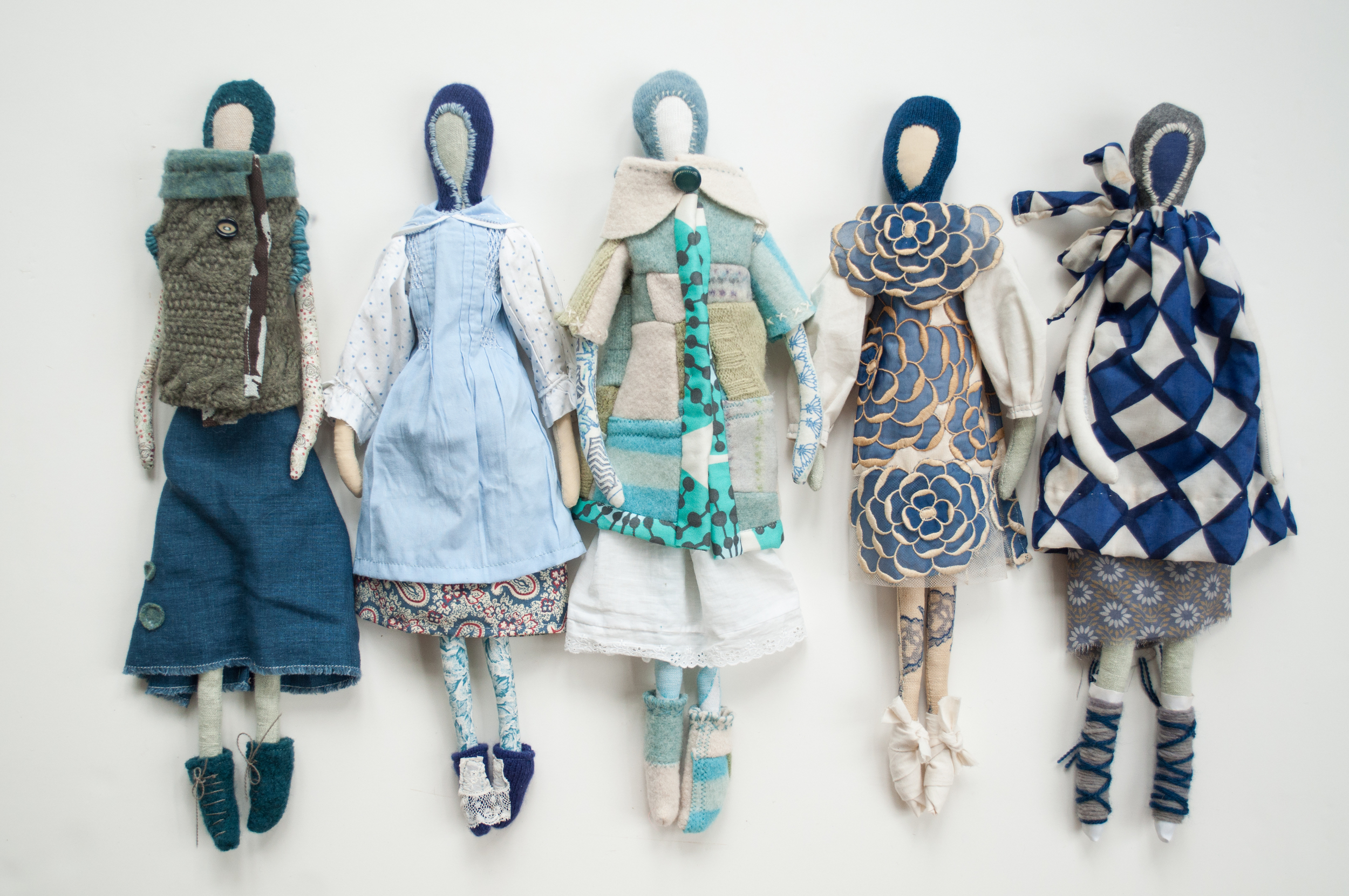 My dolls are each created from remnants that I have gathered over the years and stashed in the attic. Many of their garments were once my grandmother's, other bits have been thrifted and accepted as donations, and then there are a smattering of new infusions, mainly Liberty of London fabric, as its patterns speak of times past. I'm hoping to do a series of fifty, each one deeply herself, yet completely unknown in some way. As I unfold each fabric, find a conversation between the different bits and slowly stitch each creature into being they whisper to me of their love and longing, of their whimsy and dreams, of deep passions welling up and burbling over, eager to be in the world. I hope to hear these whispers, to listen closely and share each imagined life, to find lightness along the tunnel of time where it doesn't always live.
