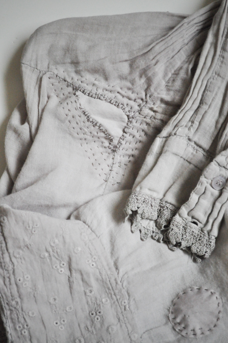 Over time I allowed all those love worn pieces to pile up in a corner of my studio and when the pile became to daunting I shoved the whole lot of it in the attic, lost but not forgotten. Every now and then I remembered a favorite item lost to the abyss of the mending pile and wished for it, but never quite took the time to sit down with needle and thread to repair the poor garment. Sure I'd done a quick fix with the sewing machine or put a button back on a child's coat, but really taking the time to re-inspire a garment with mending was a passing thought rather than an intentional act. Oh I remember the winter I sat on the couch patching a pile of SmartWool socks that had worn through at the toe or heel, and I still wear those socks, patched and hole-less...and then there are the ones with holes that I continue to wear, but the commitment to repair has come and gone, it has wavered. I think it is high time for a re-commitment to all the clothes that have served me well and made me so much myself, to take a vow of repair, of revitalization. 