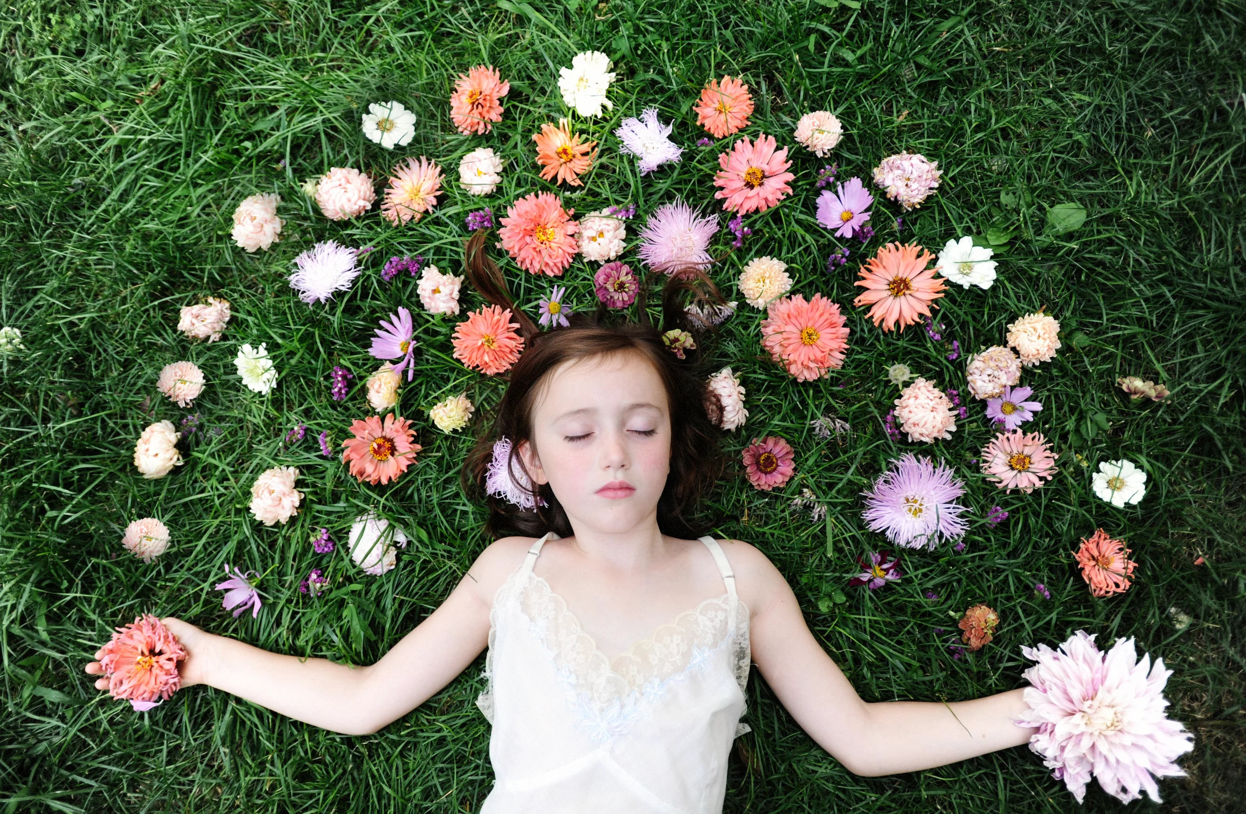 There is something about the preciousness of youth and the the preciousness of flowers, how each passes like sand through an hourglass, changing and shifting with the drop of each grain. There is a vulnerability to each, but also a tenacity and an impressionability countered by a bold unique spirit. 