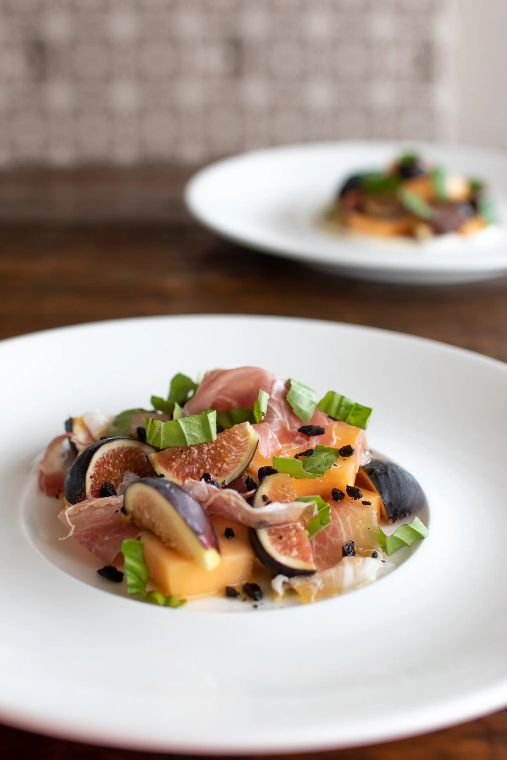 Figs & Melon with Prosciutto, Dried Black Olive & Basil // photo by Stephanie Cornell