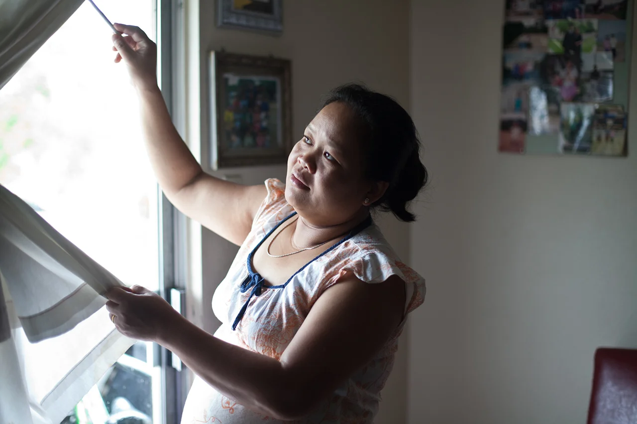 I've been working on my long-term photo documentary project on the Htoo family for the past four years. I started this project in graduate school to capture the assimilation of Burmese refugees. I've continued to photograph the Htoo family well past my school project and now I am not sure what the project has turned into because they have assimilated pretty well. When I am not traveling, I go their house on Sundays and just spend a few hours hanging with the kids or taking photos. I am so grateful that they welcomed me into their lives and the least I can return is give them prints. My original black and white images "Strangers in A New Land" has been published in several media including Texas Observer. A gallery of select images are currently housed at the Asian American Resource Center . It was written about in The Daily Texan. It's been in different photo shows . Paw Htoo Raw, the mother recently gave birth to a baby girl. This photo was from April 2014 where she is still pregnant. With the recent addition of a baby girl to their family, I feel like this is a new phase in their lives. I've decided to show the color of their lives now that they've assimilated. I will be posting photos from my Sundays with the Htoo Family here on my blog going back from April to present day. 