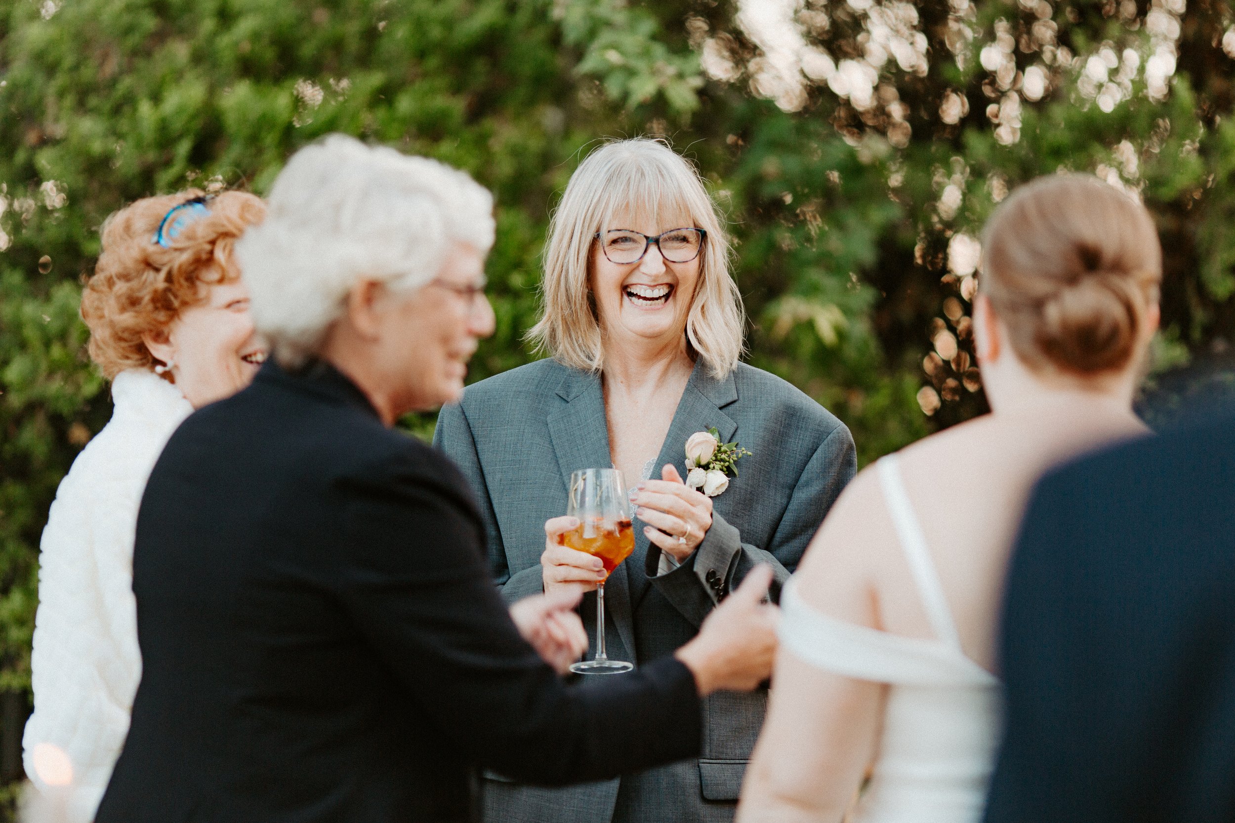 Guests Laughing with Cocktail.jpg