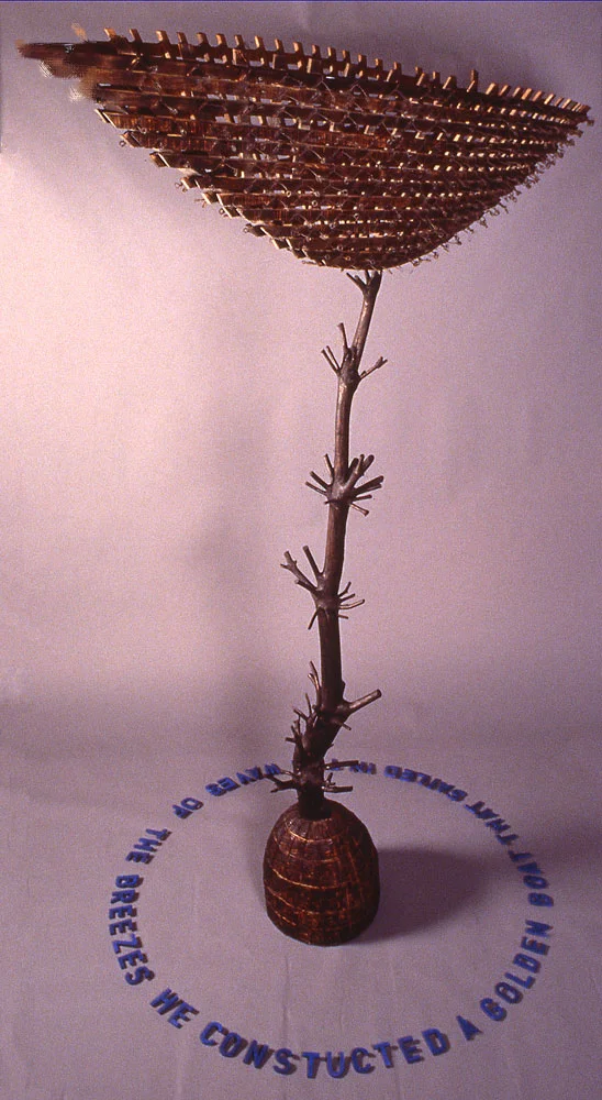 "Ritual Monument II", wood sculpture, 12' h x 8' w x 3' d ; painted and burnt wood, wire; © Tom Gormally