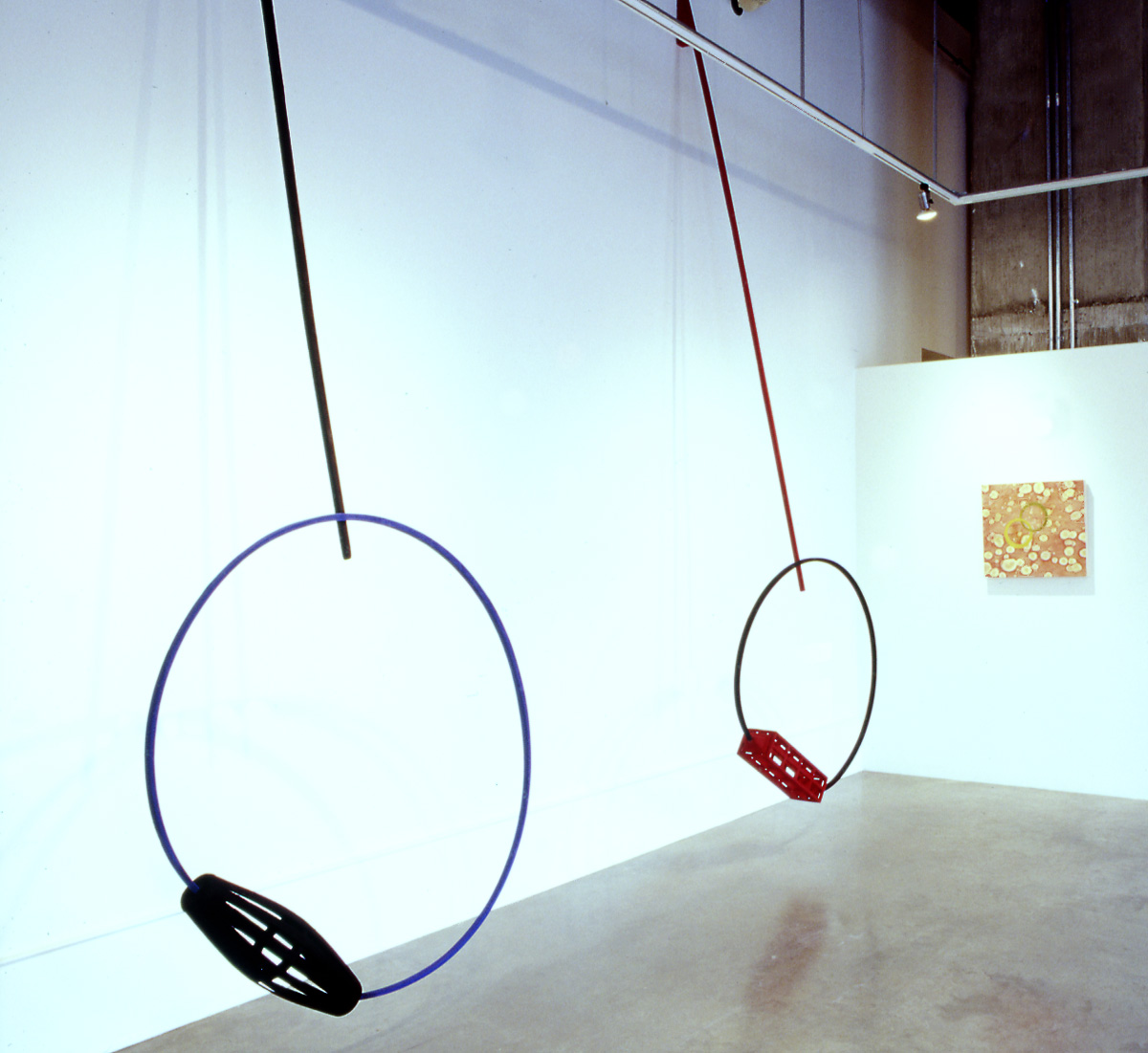 "Portals I & II, wood sculpture, 12' h x 4' w x 3' d each; flocked oak and pine; installation view, @ Tom Gormally