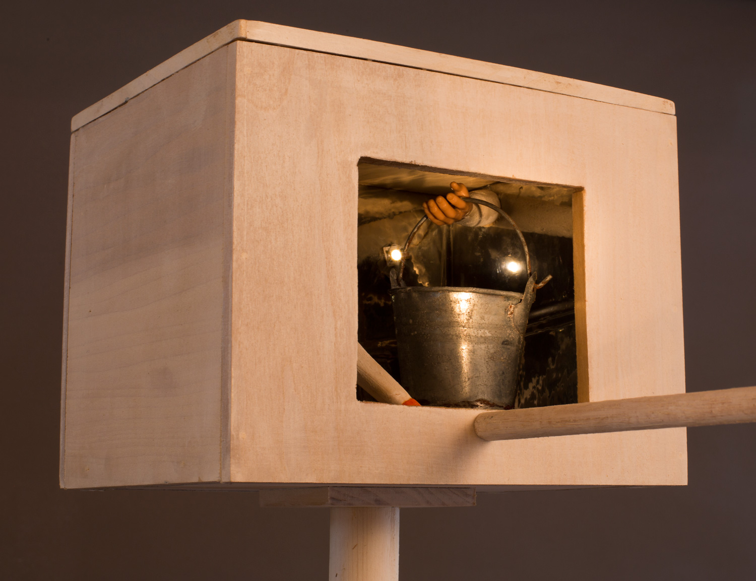"Bucket Brigade" (detail), 64” h x 7” w x 42” d, wood, mylar, solar collector and light bulb, metal, found object; ©Tom Gormally 2014