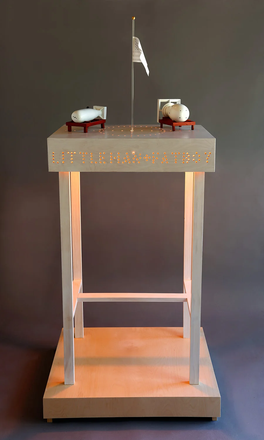 "Monument or Memorial", 63" h x 27" w x 18" d; wood, plexi rod, gold leaf, paint, cloth, LED lights; © Tom Gormally 2018
