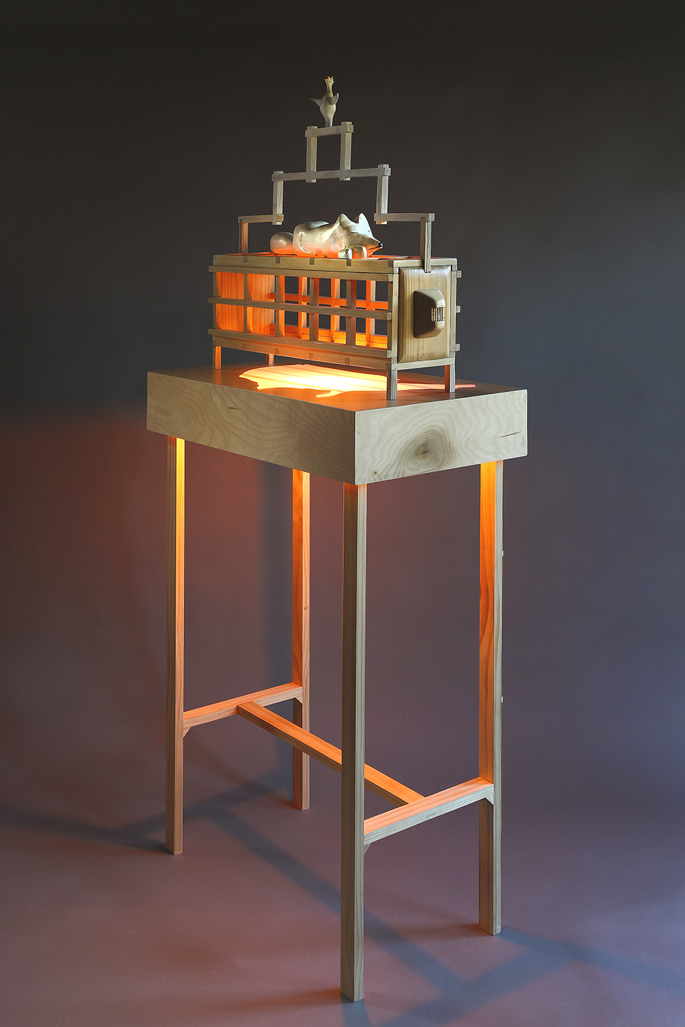 "Fox Trap", 65" h x 28" w x 16" d; wood, stain, plexiglass, acrylic paint, LED light; © Tom Gormally 2018