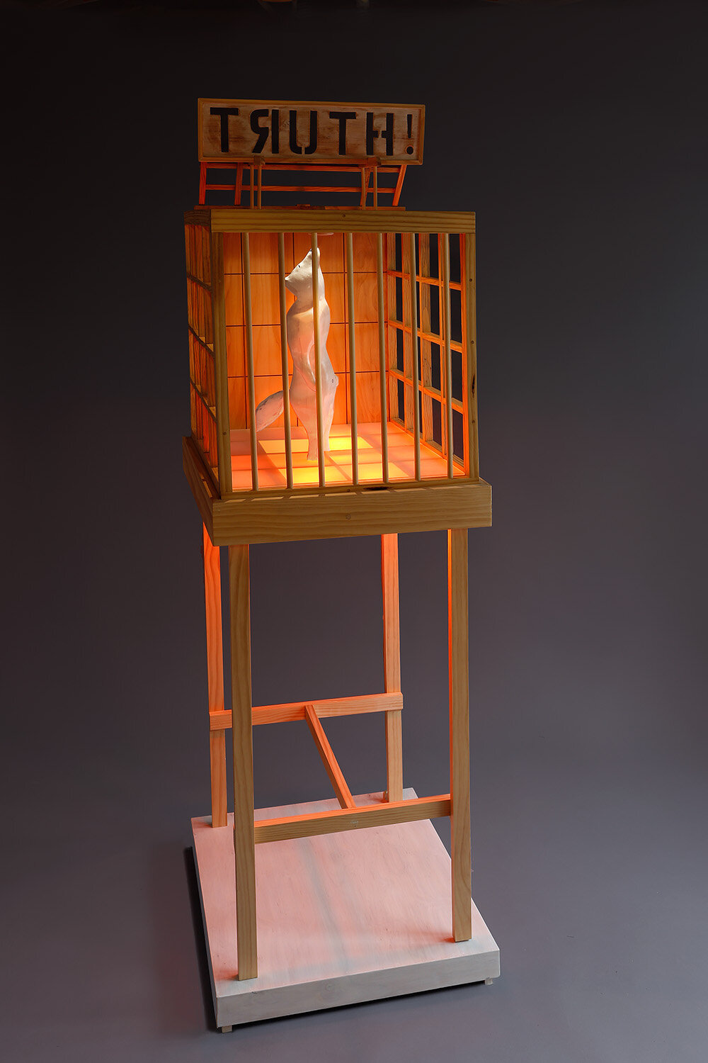 “Mangy Blind Fox Seeking Enlightenment,” 80"  x 24" x 26," Carved and fabricated wood, pickling solution, LED light, rubber, wire screen, @ Tom Gormally 2019