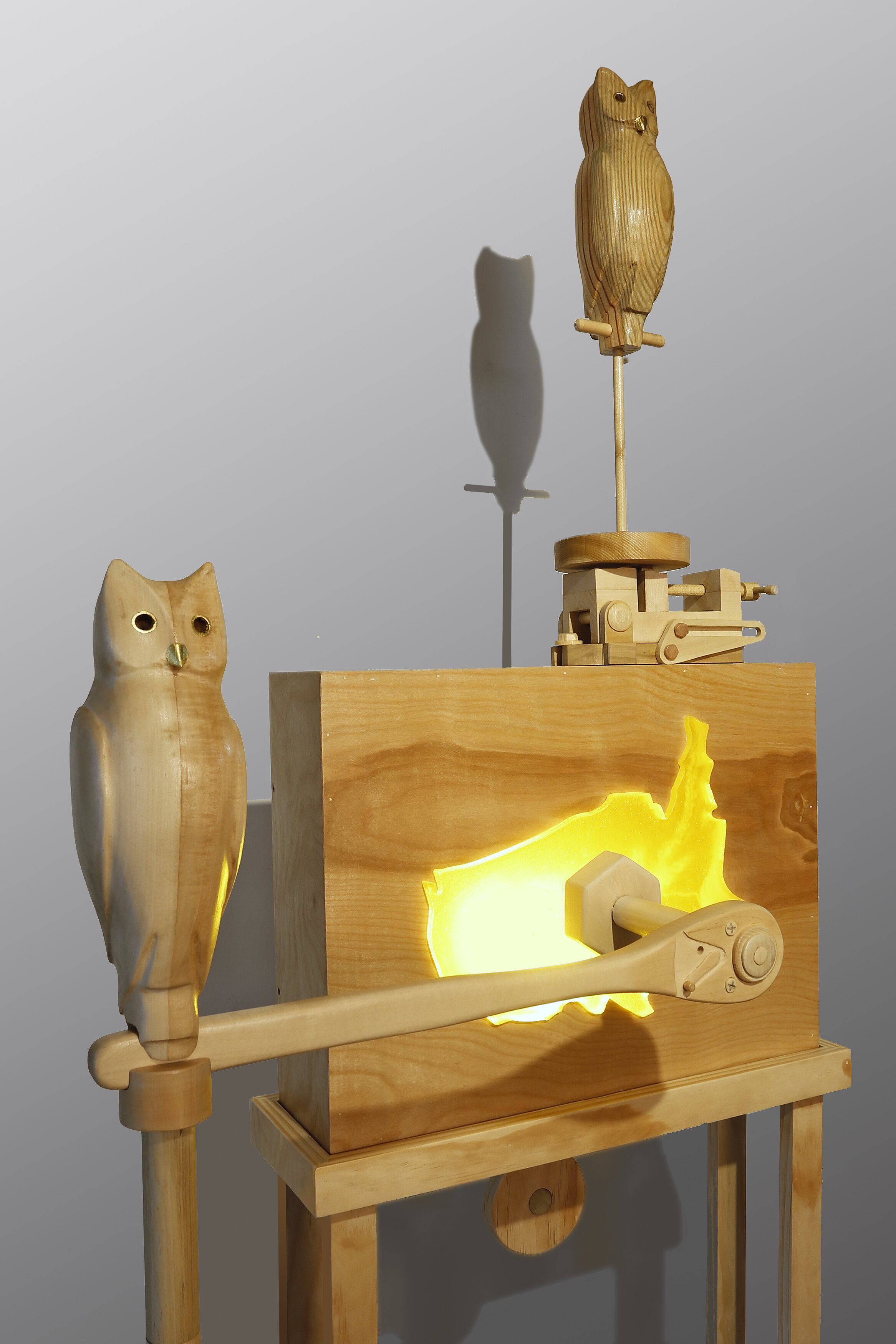 "Wrench with Vice and Two Owls" (detail), 2021. 80” x 30” x 27”, wood, cast resin, electric light, porcelain