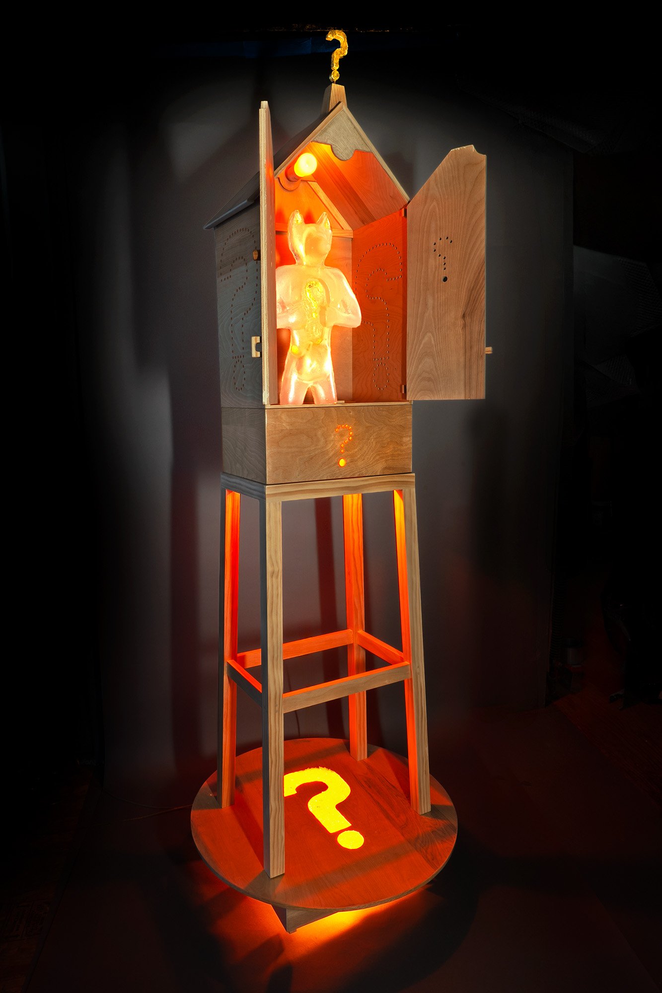 "Saint Doesn't Know Whether He Is Coming Or Going", 2026. Wood, cast glass, LED light, gold leaf, resin.  28” x 28” x 82”  Photo: Mark Woods