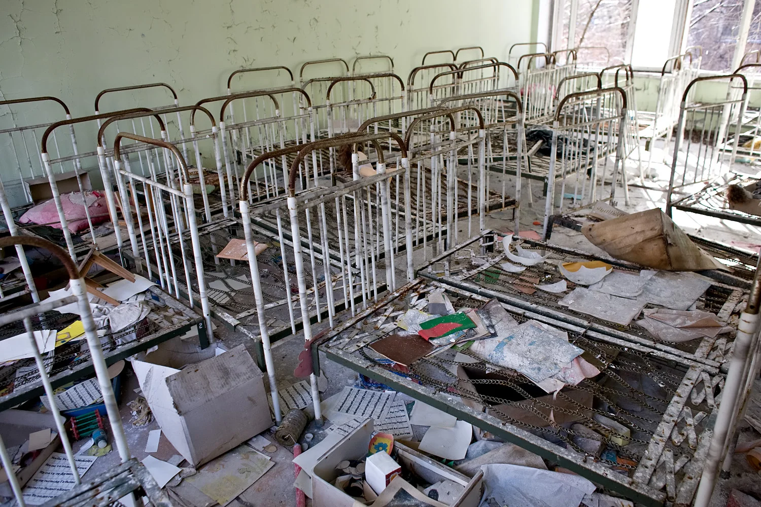 Cribs and beds in the nursery.