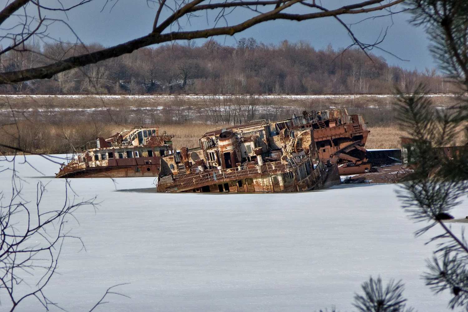 After leaving Pripyat, back to the town of Chernobyl, the very contaminated abandoned ships on the frozen river harbour.