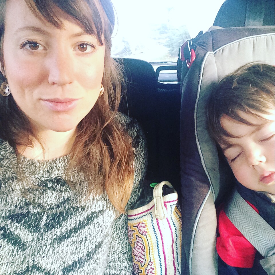 Enjoying the ride with my little guy in the backseat and my journal.