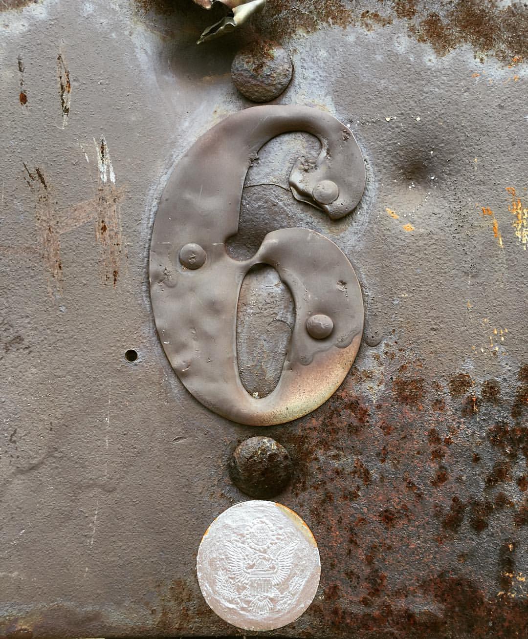 i-geeked-out-over-the-presidential-seal-at-the-bottom-of-this-sign-america-6-presidentialseal-rust-metal-288365_22108602434_o.jpg