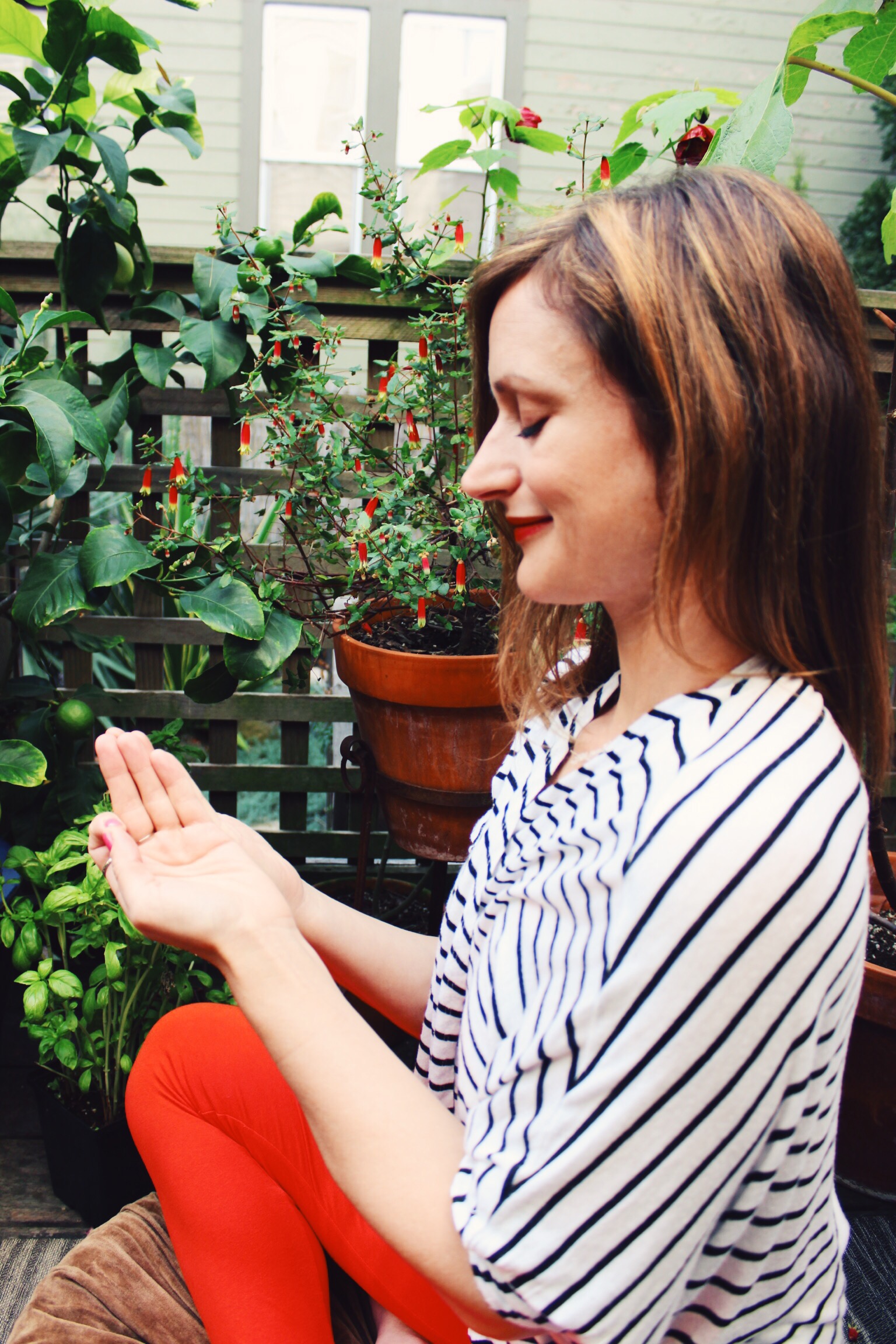 While it looks like my eyes are closed, they are actually fixed on my fingers, just past the tip of my nose. This is known as "lotus drishti " - a yogic gaze that stimulates the pineal gland, which is responsible for regulating sleep and sex hormones.