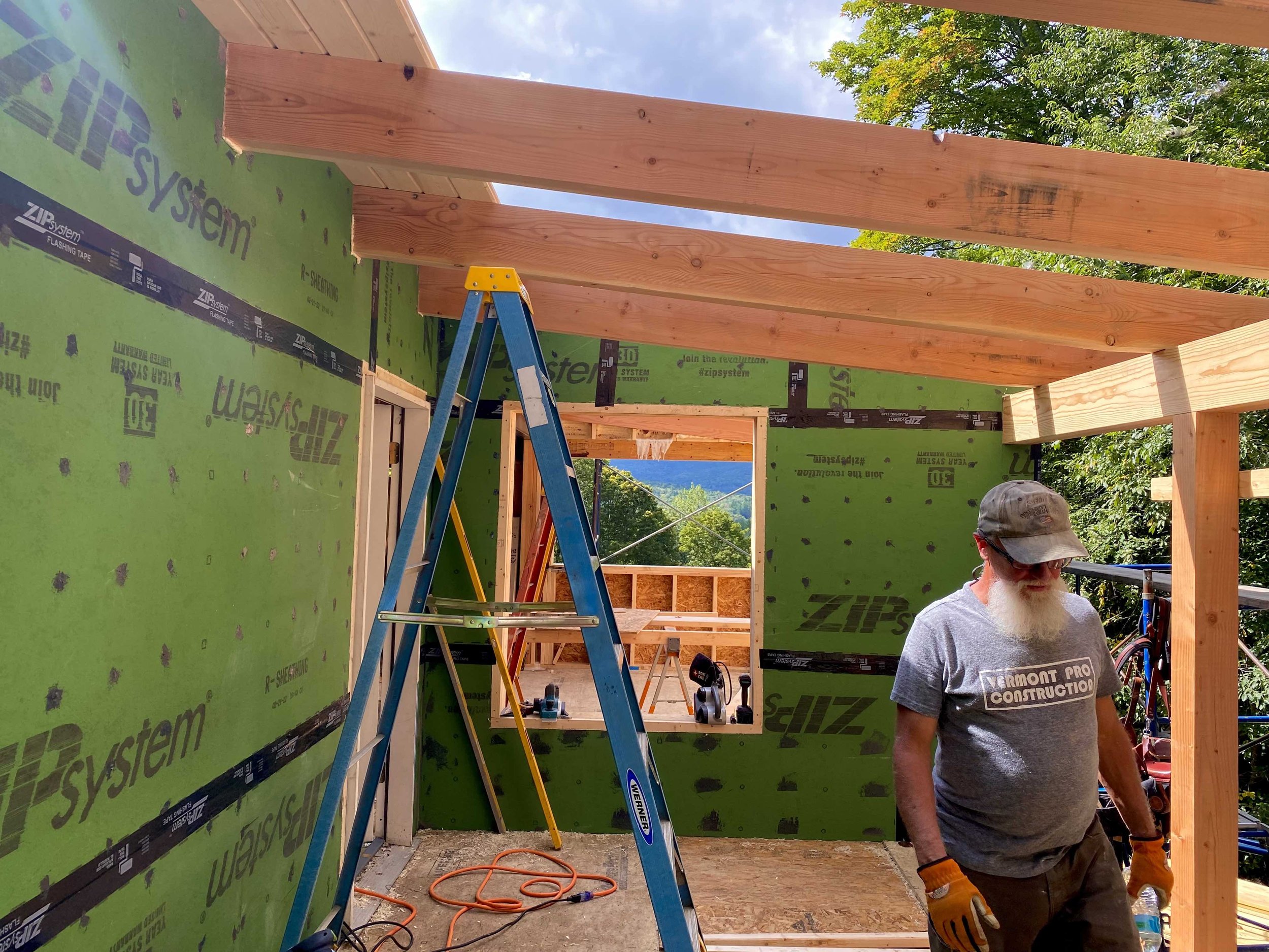 Steve at work framing rafters.jpg