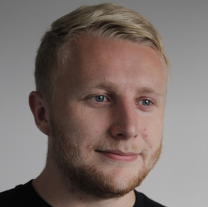 headshot_adam_rogers.jpeg