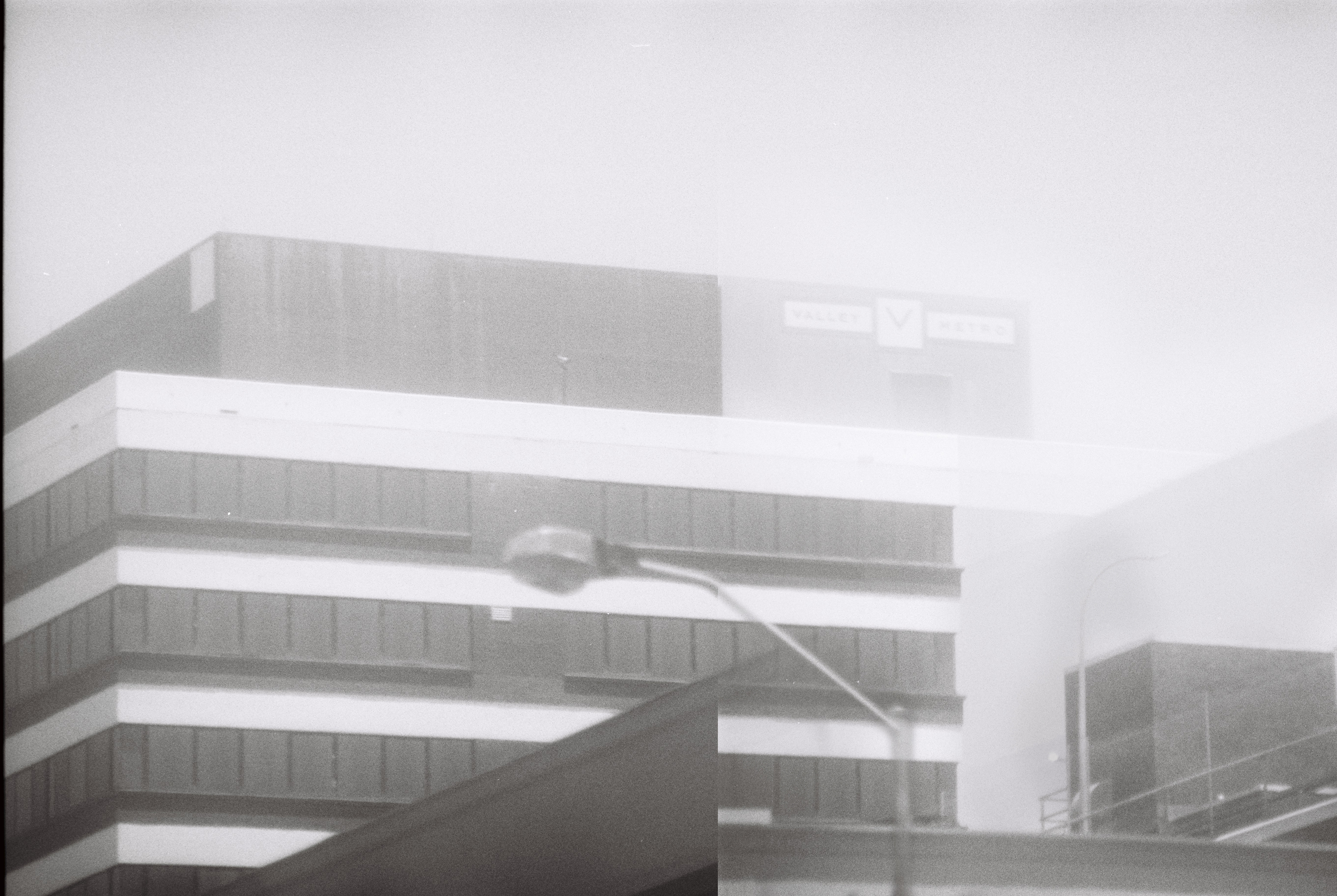 Valley Metro. Lost in Transportation. Blended together to give a double exposure.