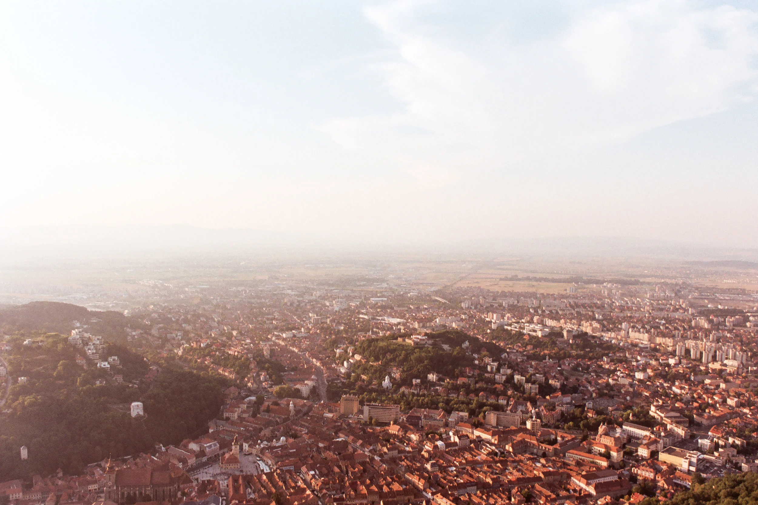 The setting sun over the town and beyond.