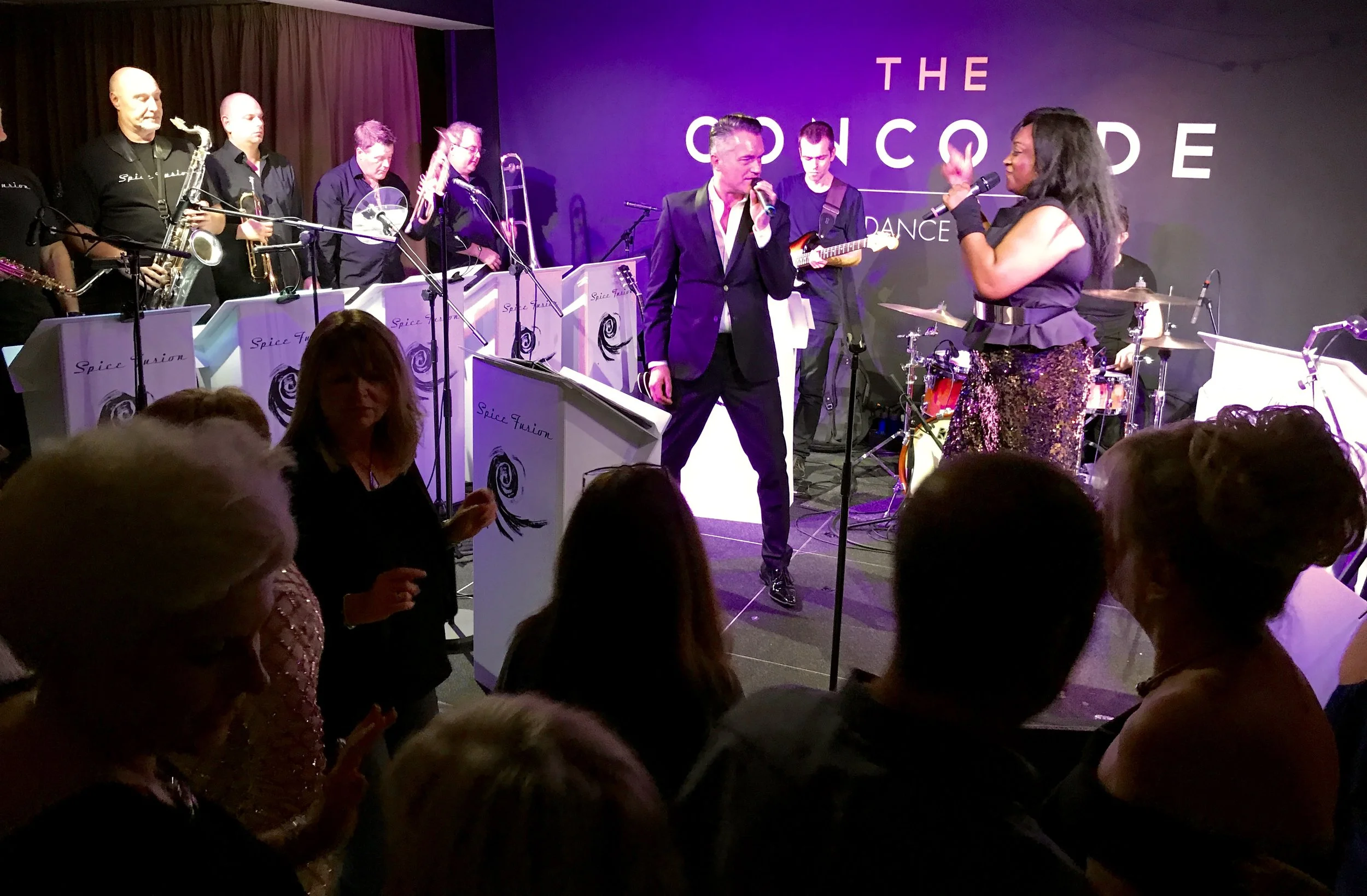 Iain Mackenzie and Sandra Marvin with the Spice Fusion 9-piece band
