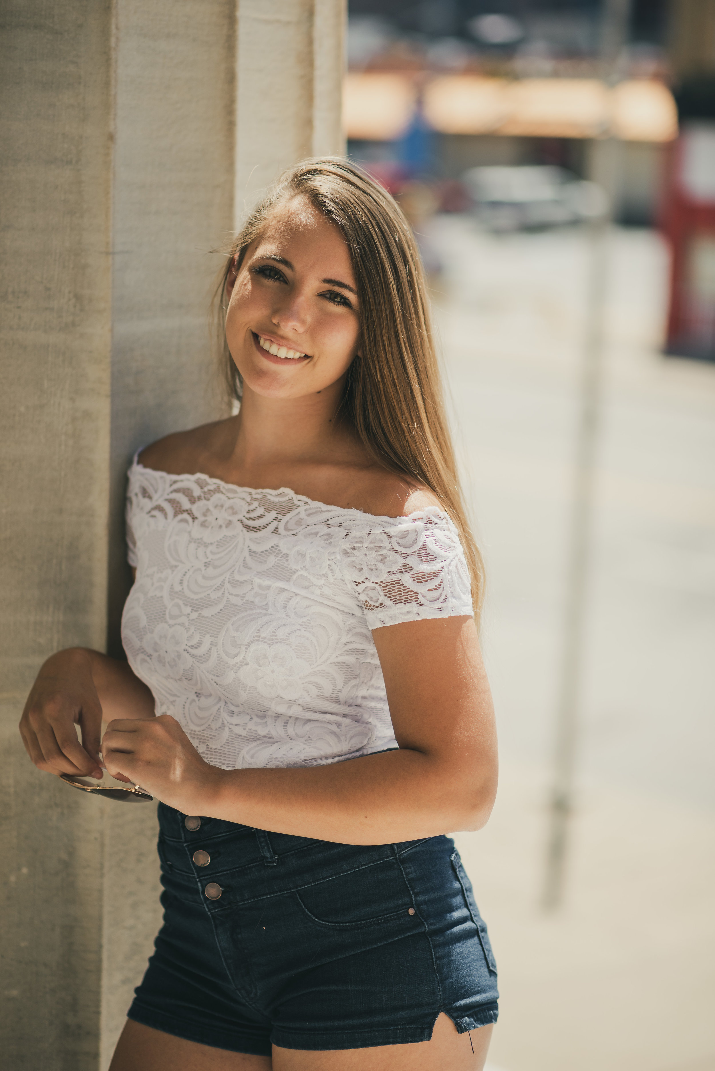 Graduation Portrait on steps of Erie Art Museum