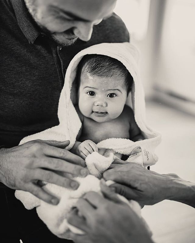 Is there anything cuter than a little one straight out of the bath into Dad's arms, in a hooded towel?