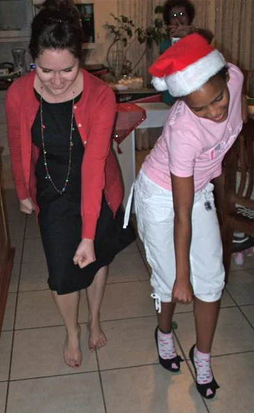 Nissi wears my heals to teach me the dance to All the Single Ladies.
