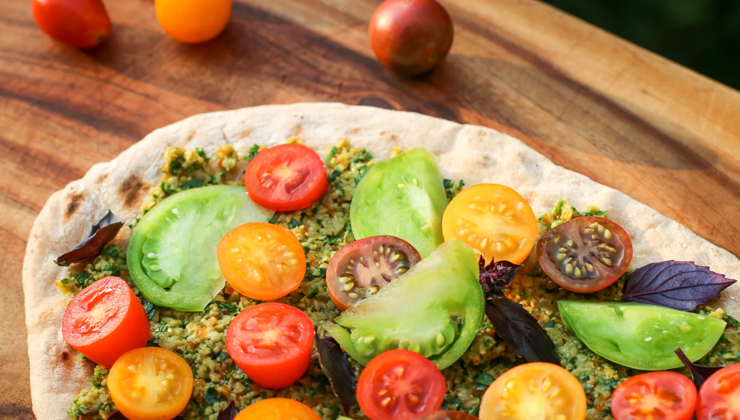 The Hungry Hounds— Grilled Spelt Flatbread with Tapenade & Tomato