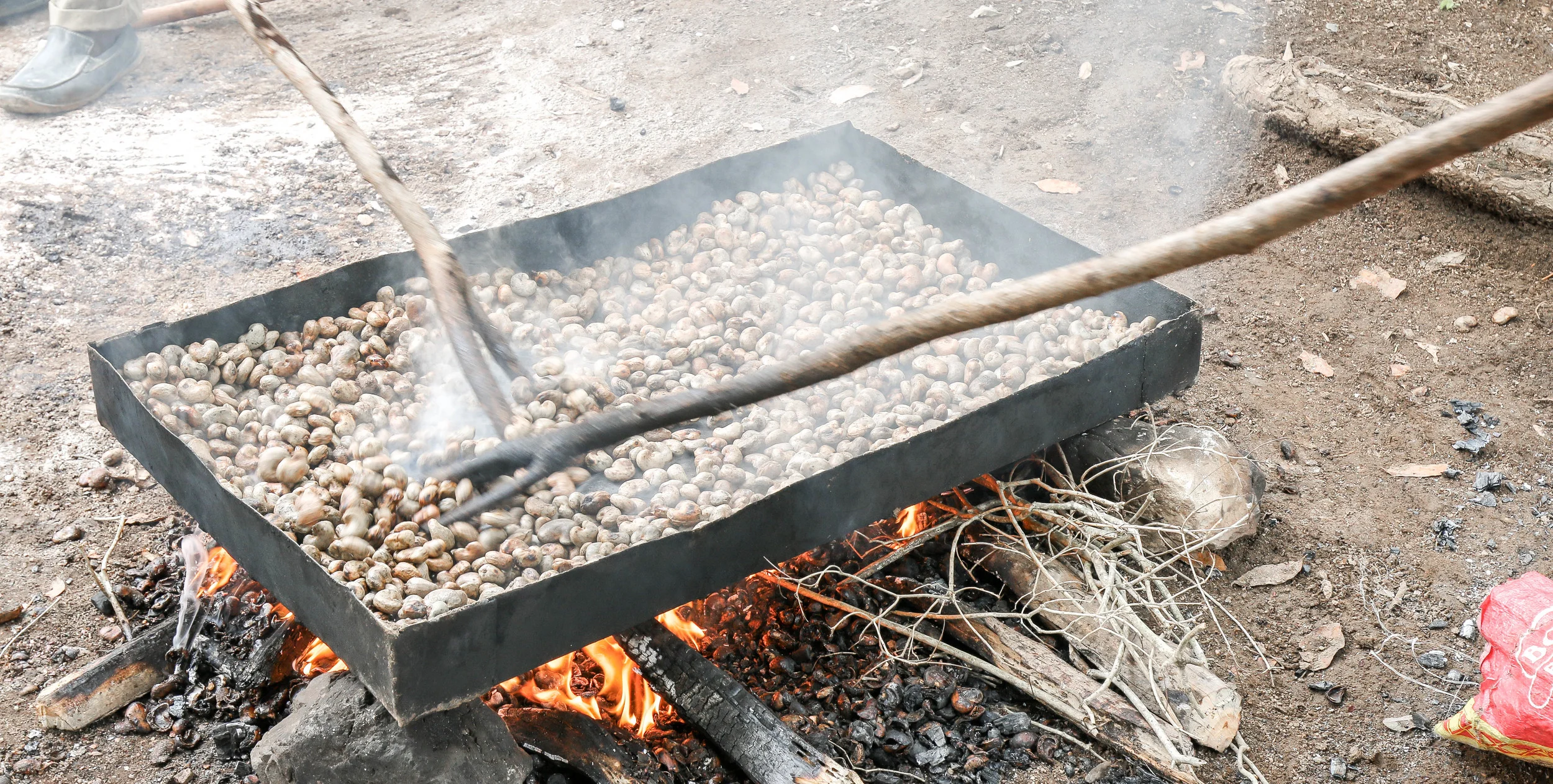 Cashew nuts, cleaned and beginning to roast -- Mombin Crochu, Haiti