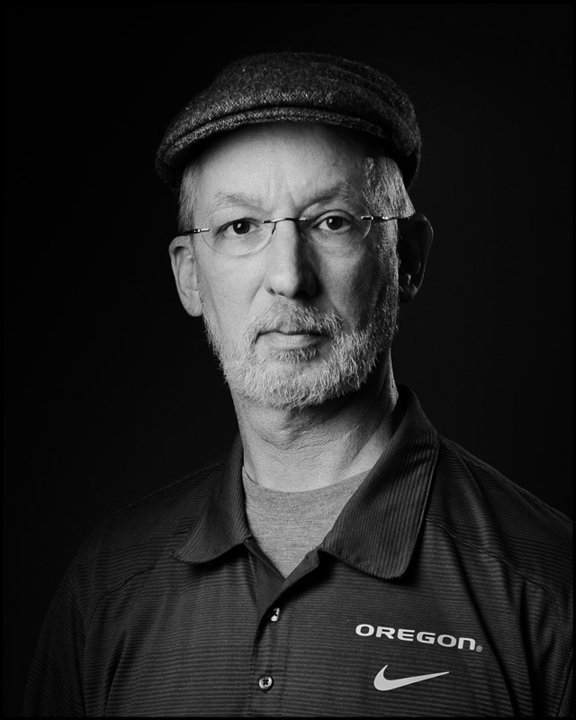 24x24" soft box and a second gridded flash to provide fill and rim light on the left side of my head