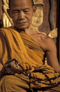 Buddhist with Prayer Beads