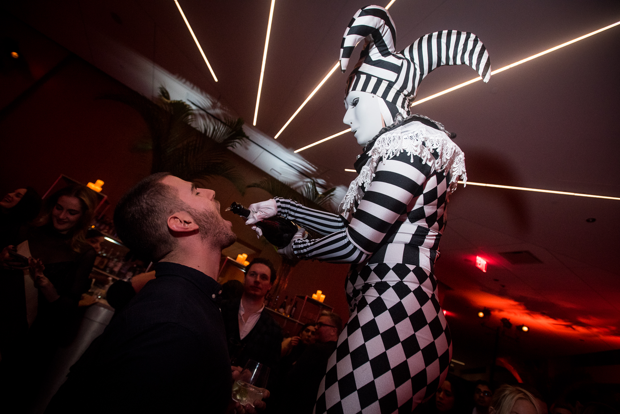 Harlequin Stiltwalkers