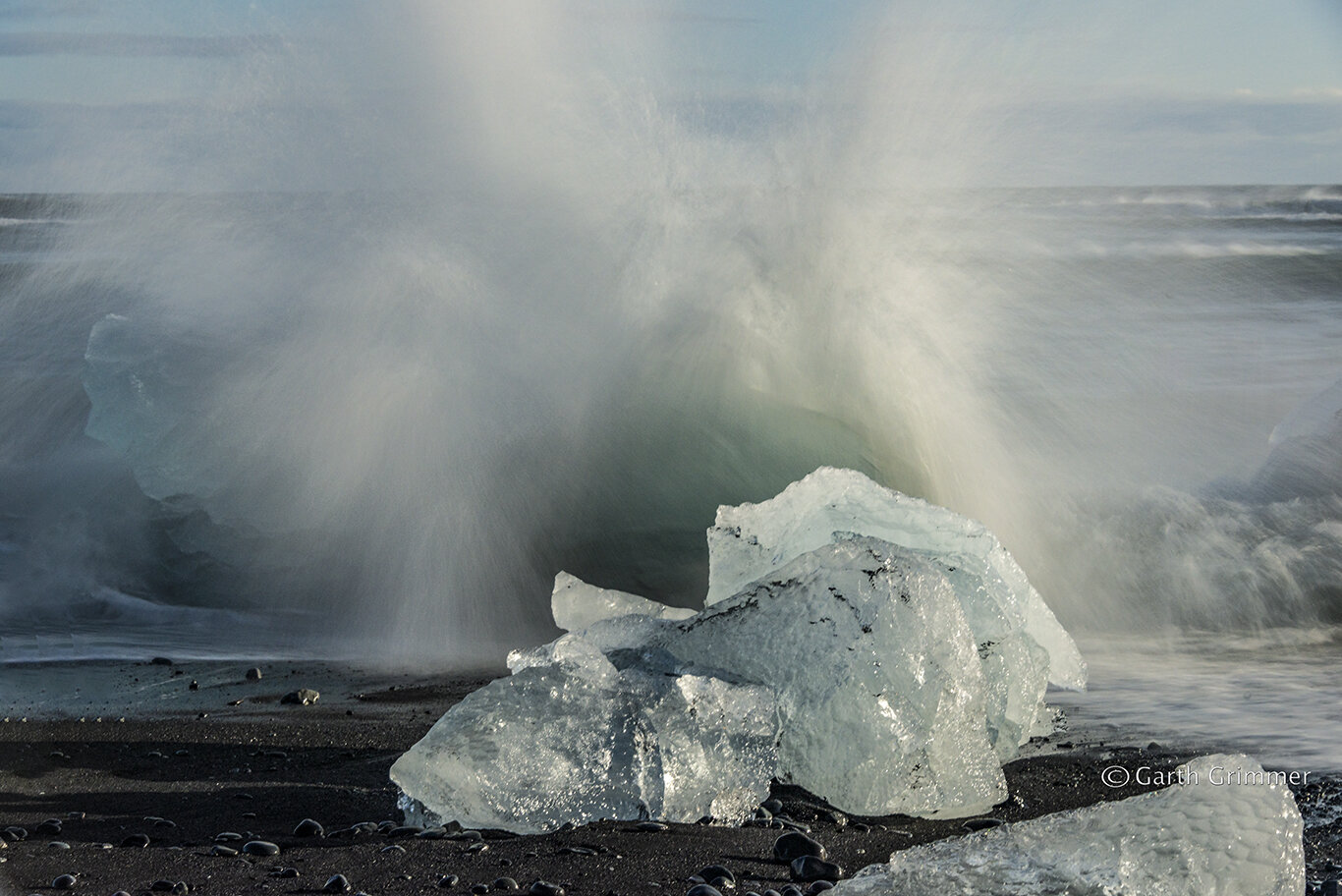 Waves push ice ashore