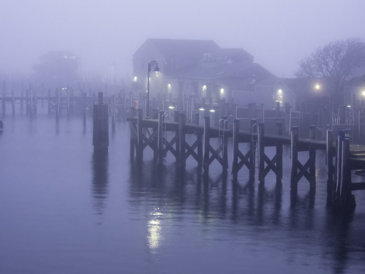 Boat slips in mist