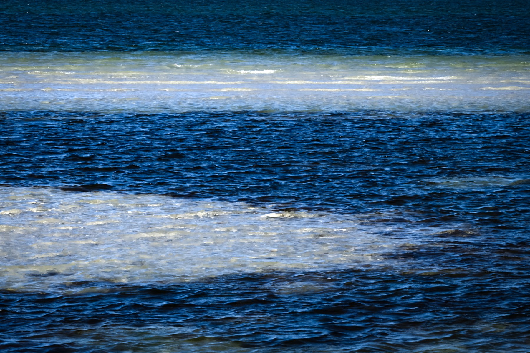 Abstract - Waves over sandbar at low tide
