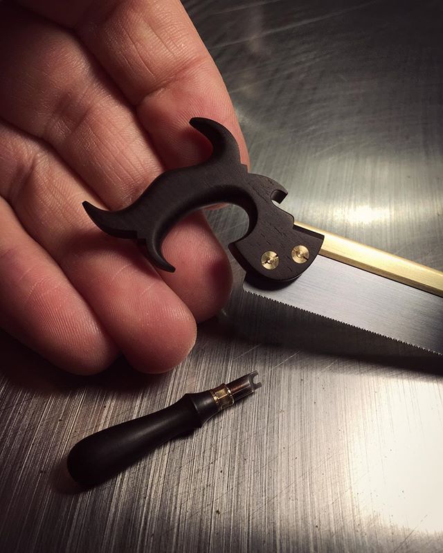 Split nut hardware with matching screwdriver.