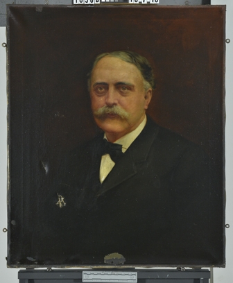 The before treatment image of Burchfield showing two tears in the lower left quadrant in addition to an exceptionally discolored varnish layer.
