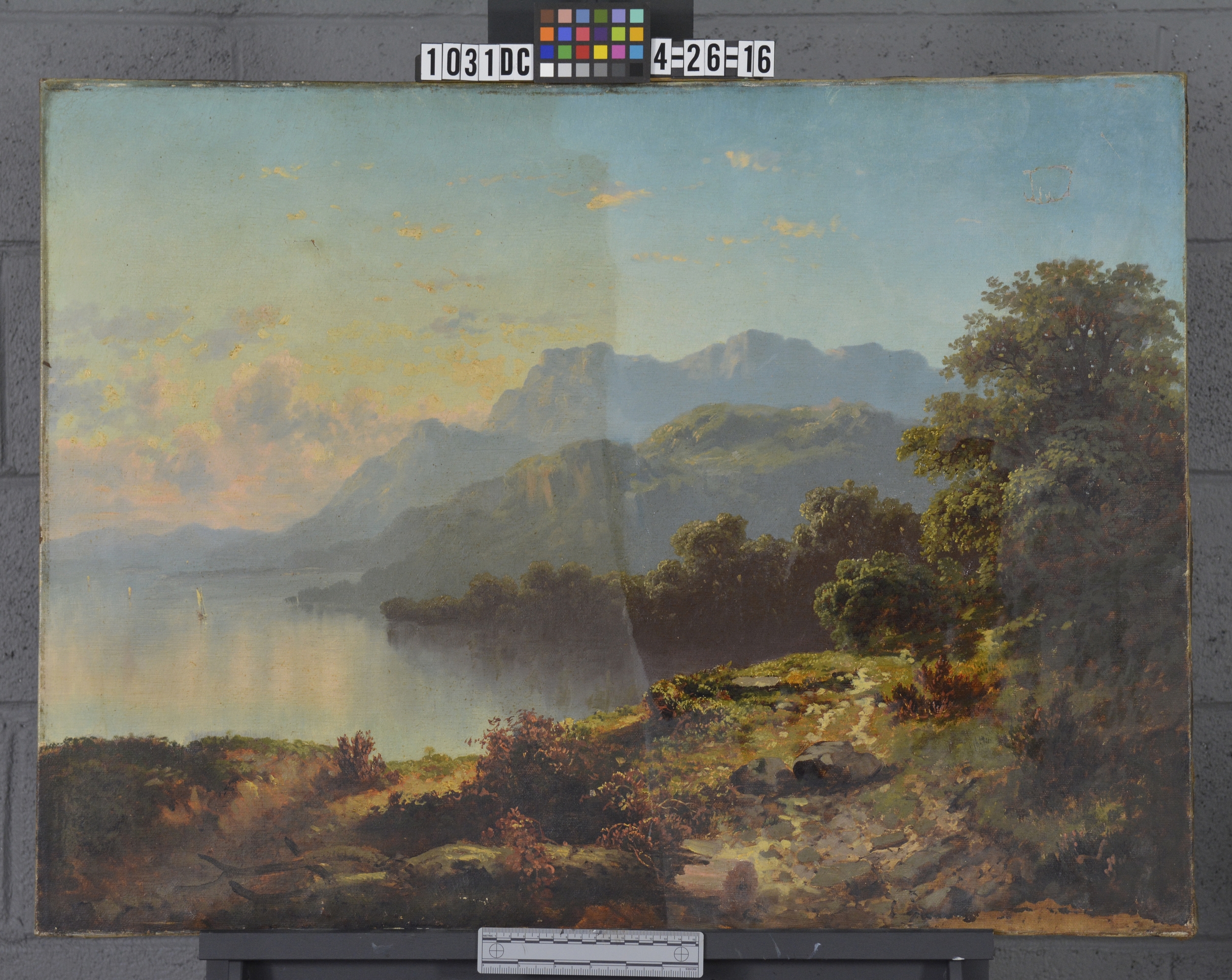  During cleaning photograph of a Hudson River Landscape.&nbsp; Dirt and Varnish are removed to reveal original colors, contrast, and atmosphere. 