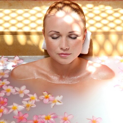  Portrait of beautiful woman in milk bath 