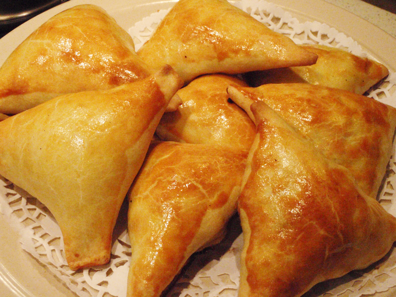 Samsa is made in a tandoori-like oven and usually main ingredient inside is lamb, beef, or cheese, and less often cabbage.