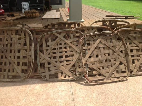 Tobacco Baskets $20 each (or 10 for $100) - Tobacco basket look great hanging on a wall, here's a great example of one over an entry table