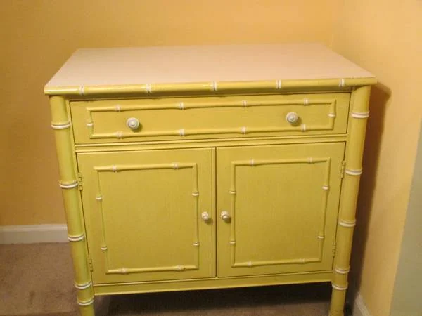 Thomasville Faux Bamboo Table $125 - This could be a great pop of color in a room. Check out this blog post for decorating ideas for faux bamboo furniture. 