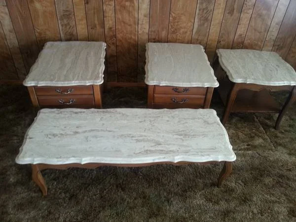 Set of Four Marble Top Tables $175 - So I agree in their current state these tables aren't great however the marble is a great color and painted grey or white these pieces would look fabulous, the marble on them alone is probably worth $175. I especially love the two end tables and think they have a lot of potential. 